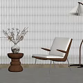 Modern Living Room With Armchair Floor Lamp Wooden Side Table And Dried Branch Vase