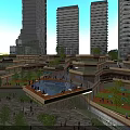 Modern Tall Residential Buildings With Green Spaces Water Features And Surrounding Roads