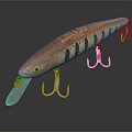 Fish Shaped Fishing Lure With Red Brown Body Black Stripes Yellow Eyes And Metal Hooks