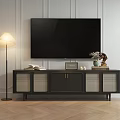 Modern Black TV Stand with Woven Doors Books Clock Vase Decorative Item and Floor Lamp
