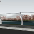 Modern Metal Fence With Horizontal Bars Along Waterfront Green Grass And Blue Sky