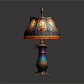 Colorful Decorative Table Lamp With Floral Pattern Shade And Ornate Base