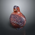 Decorative Bird Sculpture With Red And Purple Textured Surface And Rounded Shape