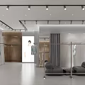 Modern Fashion Clothing Store Interior With Mannequins Hanging Apparel And Display Racks