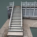 Decorative Stone Staircase With Ornate Metal Railings And Lattice Wall Design