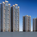 Modern High Rise Residential Buildings With Balconies And Windows Under Blue Sky