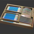Organized Wooden Tray Cutlery Set With Blue Handle Knives Forks And Spoons