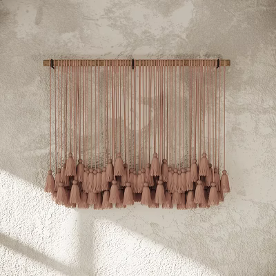Pink Tassel Wall Hanging With Wooden Rod On Light Colored Wall 3d model