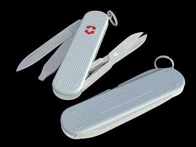 Swiss Army Knife With White Dotted Handle Key Ring Open And Closed Positions 3d model