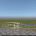 Building Exterior Wall Featuring White Railings Wooden Deck Over Green Field Under Blue Sky