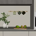 Hanging Basket Plants In Modern Kitchen With Avocado Mugs And Oven