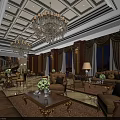 Luxurious Lounge Area With Chandeliers Brown Sofas Coffee Tables And Green Plants
