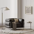 Stylish Single Seater Leather Sofa With Geometric Cushion And Floor Lamp In Modern Living Room