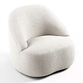 Cream Colored Single Sofa With Plush Fabric And Curved Modern Design