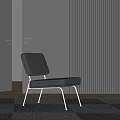 Gray Leather Lounge Chair With Metal Legs Against Vertical Slat Wall And Geometric Rug
