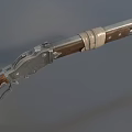 Vintage Lever Action Rifle Featuring Detailed Wooden Stock And Metal Barrel
