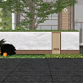 Modern Feature Wall Design With Green Plants Lighting And Stone Paving At Building Entrance