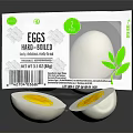 Free Range Chicken Eggs Halved Boiled with Carton and Green Leaf