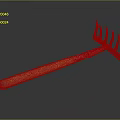 Garden Rake With Yellow Wooden Handle And Metal Tines Showing Reflection On Black Background