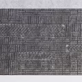 Gray Brick Background Wall Featuring Layered Patterns and Textured Mortar Design