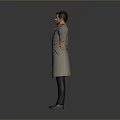 Portrait of man wearing long trench coat and shirt with arms outstretched against gray background