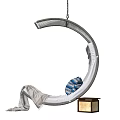 Stylish Modern Hanging Chair With Curved Frame And Blue Patterned Pillow For Home Comfort