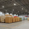 Spacious Industrial Warehouse Interior With Stacked Boxes On Pallets And Shelves