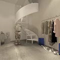Modern Clothing Store Open Space White Walls Gray Floors Racks Display Counter Spiral Staircase