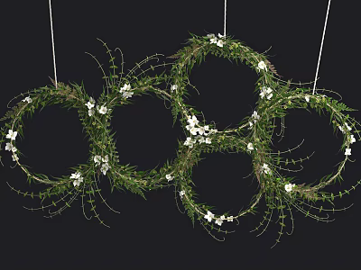 Three Hanging Flower Wreaths With Green Vines And White Small Flowers 3d model