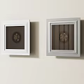 Two Stylish Air Conditioner Vents with White and Silver Frames on Light Wall