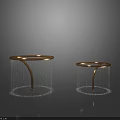 Shiny Golden Circular Garden Ornaments With Curved Stands And Decorative Bead Accents