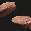 Red Textured Stone And Natural Wood Decorative Pieces With Surface Details On Black Background