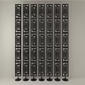Black Decorative Room Screens With Intricate Patterns Arranged On Stands Indoors