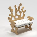 Abstract Shaped Sofa Featuring Wooden Structure Irregular Holes and Curved Design with Floral Cushion