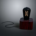Black Computer Peripheral Device With Red Wooden Base Gold XII Symbol And Black Cable