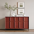 Red Textured Entryway Cabinet Sideboard With Green Plant Picture Frames On Light Wall