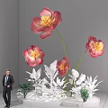 Vibrant Floral Display With Pink Red Blooms And Two People In White Floor Setting