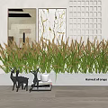 Golden Grass Like Plant Arrangement In White Rectangular Planter With Deer Figurines And Decorative Paintings