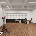Spacious Photography Studio With Wooden Floor White Walls Brick Accents Windows Bookshelves Tripods Lighting TV