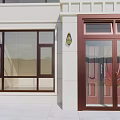 Elegant Entrance Door With Copper Frame Glass Window Wall Lamp And White Building Wall