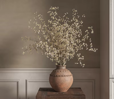 Ceramic Vase With Carved Details Holding Dried Flowers On Wooden Table Against Light Wall 3d model