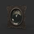 Photo Wall With Vintage Carved Oval Frame Black And White Man Portrait In Suit