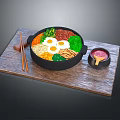 Traditional Bibimbap in Stone Bowl with Fresh Vegetables Eggs Meat Chopsticks and Sauce