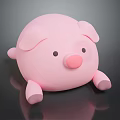 Pink Round Pig Toy with Black Eyes and Pink Nose on Black Background