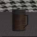 Wooden Mug With Black Lid And Handle On Woven Mat Houndstooth Background