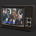 Vintage Television with Wooden Case Displaying Audience and Host with Microphone