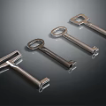 Four Different Designed Metallic Shiny Jewelry Keys on Dark Gradient Background