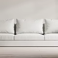 Modern White Three Seater Sofa In Minimalist Interior With Soft Cushions And Wooden Floor