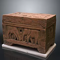 Intricately Carved Wooden Chest With Elephant Motifs On White Base Dark Background