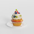Freshly Baked Cupcake Topped with Whipped Cream Blueberries and Strawberry on White Plate